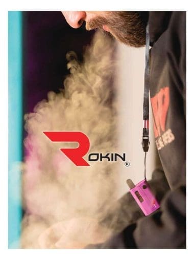 A bearded man exhales vapor, with a pink vape pen hanging from his neck and a "ROKIN" logo.