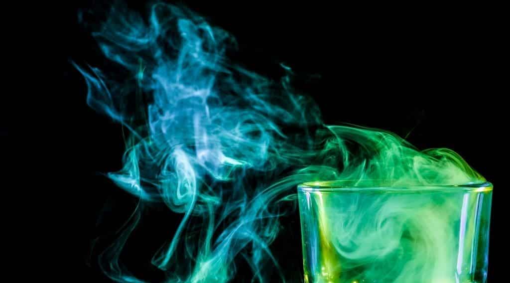 shutterstock_1042532983_compressed Glass with colorful vaping smoke