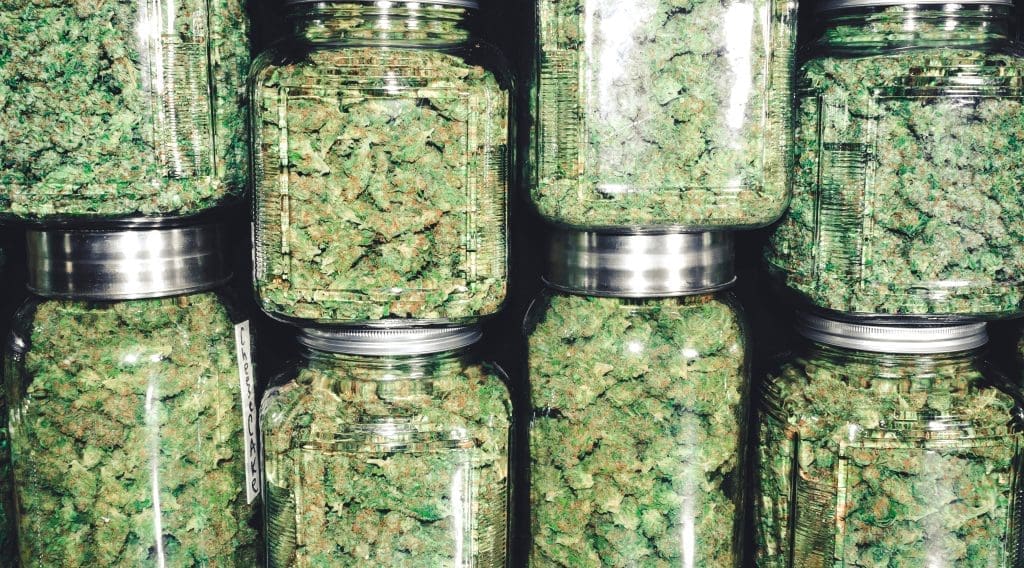 Marijuana,Buds,In,Glass,Jar,Stack weed in glass jars